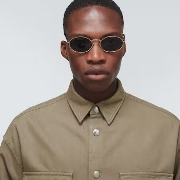 Prada PR65ZS ZVN09T Sunglasses Pale Gold Dark Grey Oval Metal Unisex - Picture 15 of 15